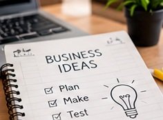 Notebook with a plan for a creative business